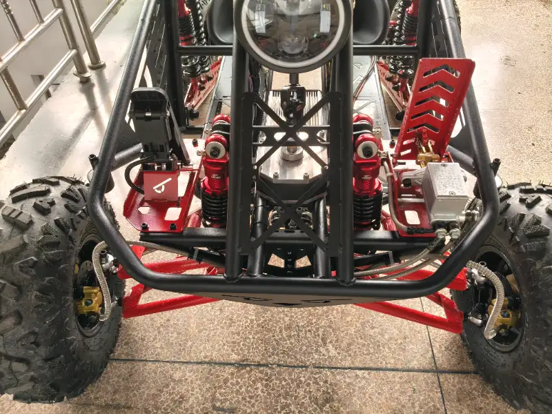 Off-road electric buggy details showing electric power system and outdoor vehicle features